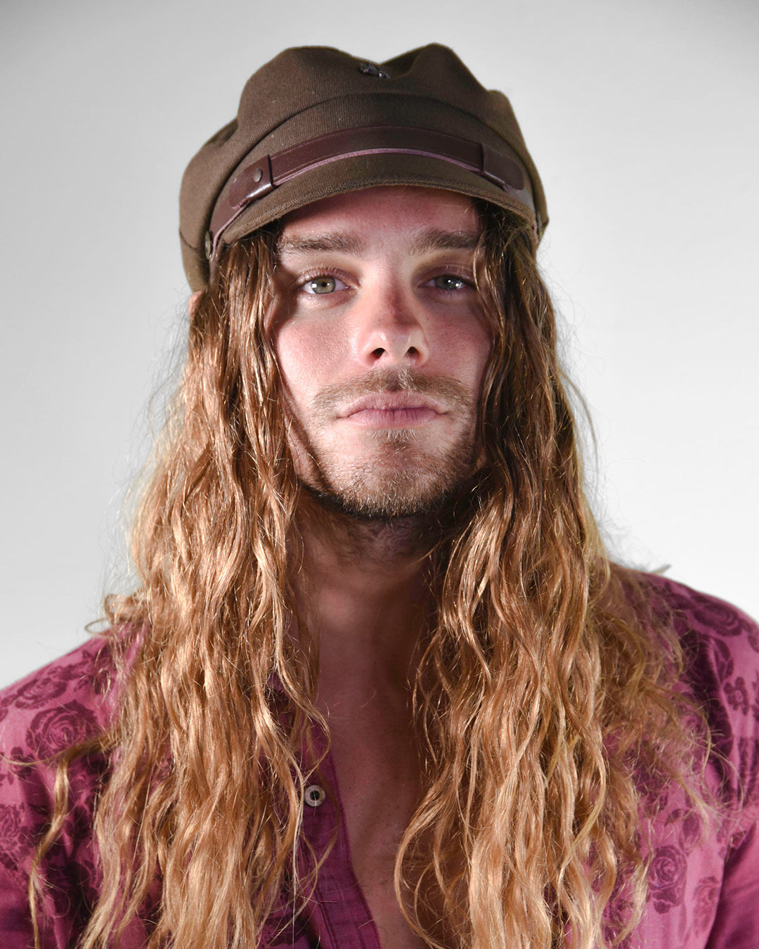 Portrait of man wearing the sea brown cap