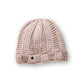 • The Transcend Classic Beanie beige close-up showing knit texture and soft neutral tone
