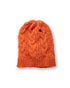 The Solstice Beanie burnt orange product shot on neutral background showing clean silhouette and bright statement colour