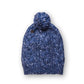 The Consciousness Beanie speckled blue worn beanie showing comfortable stretch fit and cosy cable knit construction