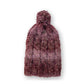 • The Cosmic Dust Beanie mauve product shot on neutral background showing slouchy silhouette and gentle colour tone