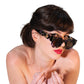 Female model wearing The Cosmos – Moondust/Amber sunglasses with cosmic frame and amber-tinted lenses. Styled against a white backdrop, the image captures a glamorous retro look, perfect for showcasing eyewear on e-commerce platforms.

