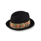 Black fedora hat with a colorful woven band on a white background