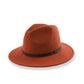Brown fedora hat with a black band on a white background