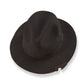 Brown coloured felt hat with bottle opener on brim