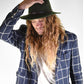 Man in a forest green wool felt hat