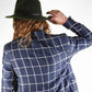 back view of man in fallenbrokenstreet hat