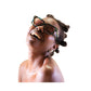 Editorial close-up of sunglasses styled by model

