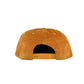 Rear view showing adjustable PUC snap back and mustard corduroy material

