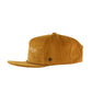 Profile angle showing the embroidered front text and structured flat brim of the mustard corduroy cap.