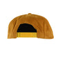 Adjustable yellow PUC snap back closure visible inside the back of the mustard corduroy cap, with black inner lining detail.
