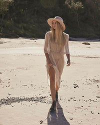 Tan Surf Hat with stash pocket, UPF 50+ rating, toggle neck string and wide brim design.
