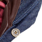 Close-up of The Twist Paperboy Cap – Blue Jean showing denim texture, metal accents, and soft satin interior.