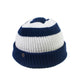 Wally Beanie Blue/White, striped acrylic knit beanie with signature button.