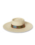 The Wanderer Cream woven straw hat with embossed leather band and metal button detail
