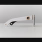 video of White and black acetate sunglasses shown front and side together, highlighting contrast and structure. The Mischief balances boldness and minimalism with finesse and turning