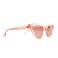 Side angle showing gold detailing on the temple of The Astral Plane Pink/Pink sunglasses with full pink acetate finish

