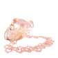 The SUPERNATURAL Chain in clear pink draped over natural quartz, paired with Fallenbrokenstreet sunglasses. A fashion-forward eyewear chain designed to be seen, worn, and admired.

