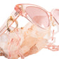 Soft pink sunglasses paired with the clear pink SUPERNATURAL Chain by Fallenbrokenstreet. The pastel combo is dreamy, ethereal, and effortlessly stylish.

