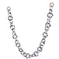 SUPERNATURAL Chain – Interstellar displayed with sunglasses on raw crystal background. Perfect for showcasing the luxe acetate shine and unique link shape.