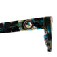 SUPERNATURAL chain in matching galaxy acetate paired with The Astral Plane sunglasses, displayed on white for accessory emphasis

