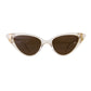Close-up of The Astral Plane – Skywalker/Amber sunglasses by Fallenbrokenstreet. Features a dramatic cat-eye silhouette in translucent clear acetate with warm amber polarised lenses. Clean white background for e-commerce.

