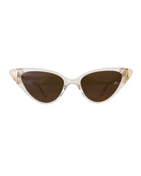 Close-up of The Astral Plane – Skywalker/Amber sunglasses by Fallenbrokenstreet. Features a dramatic cat-eye silhouette in translucent clear acetate with warm amber polarised lenses. Clean white background for e-commerce.

