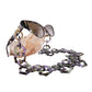 Fallenbrokenstreet’s Moondust SUPERNATURAL Chain styled on sunglasses resting on a quartz cluster. A visual blend of fashion and nature, perfect for editorial styling or gifting.

