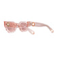 Diagonal side-back angle of THE COSMOS – Pink/Pink sunglasses. Detailed view of pink acetate frame and polarised lenses. White backdrop.

