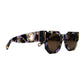 Side profile of The Cosmos sunglasses showcasing the curved acetate arms and gold-finished hardware. Ideal for Shopify product pages to highlight craftsmanship and detail of the frame and chain loops.