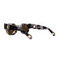 Overhead angled view of the sunglasses focusing on lens curvature, showcasing polarised amber lenses and luxe acetate finish. Useful for displaying lens tint and texture in a Shopify gallery.