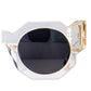 Detailed image of the rear arms of Fallenbrokenstreet’s The Cosmos – Skywalker/Black sunglasses, showcasing 24k gold accent and transparent frame. Crystal acetate and embedded gold loops for dual chain compatibility. Shot highlights the hidden “Kill Them With Kindness” engraving.