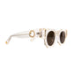 Detailed angle showing side profile of The Cosmos – Skywalker/Amber sunglasses. Captures transparent acetate arms, amber lenses, and gold-plated hoop design for front and back chain attachment. Ideal to communicate premium craftsmanship.