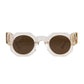 Studio image of The Cosmos sunglasses in Skywalker/Amber by Fallenbrokenstreet. Features clear acetate frame with amber-tinted polarised lenses and 24k gold accents. Showcases geometric shape and clean silhouette. Perfect for ecommerce thumbnails or primary product image.