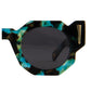 Zoomed lens view of THE COSMOS – Galaxy/Black showing off the polarised black lens and thick galaxy acetate frame. Crisp black-and-blue flecks highlight the unique cosmic pattern. Great for emphasising build quality.

