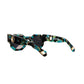 Overhead view of THE COSMOS – Galaxy/Black sunglasses with arms extended, clearly showing front and side details. Showcases overall shape and silhouette of the sunglasses laid flat. Great for scale and structural reference.

