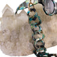 SUPERNATURAL Chain attached to sunglasses hanging downward in front of a light background. The exaggerated link size and glossy galaxy finish bring high-impact style and practical elegance to your sunnies.

