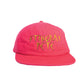 Front view of red Stingray Pete dad cap showing yellow embroidery on crown.

