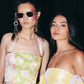 Two models wearing Fallenbrokenstreet sunglasses, including The Mischief – Skywalker/Black, at a runway or red carpet event. Captures bold fashion styling and press-worthy energy.

