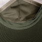Interior detail of the Needed Cap showing hidden stash pocket and printed lining

