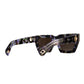 Product image showing the sunglasses at an angle from the front. Cosmic acetate and lens tint create a warm, bold look.

