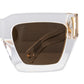 Close-up of the amber CAT2 lens and gold detailing on the white acetate frame. Highlights frame quality, chain loop, and lens tint.

