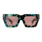 Front view of The Mischief – Galaxy/Pink sunglasses featuring a galaxy acetate frame and soft pink lenses. A bold, square silhouette with 24k gold detailing from Fallenbrokenstreet.

