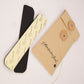 Flat-lay image showing both adhesive hat filler strips next to branded packaging. Designed by Fallenbrokenstreet, these felt strips help reduce hat size subtly and effectively. Stick them under the sweatband for a custom snug fit, especially useful for in-between sizes or styling preferences. The neutral colours match any interior and stay hidden when worn. A clean, aesthetic product presentation suitable for online shopping galleries and detailed product pages.

