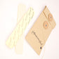 Angled photo of natural hat filler strips next to recycled packaging. Fallenbrokenstreet’s fillers reduce hat size comfortably while blending seamlessly under sweatbands. The neutral colour makes them perfect for both dark and light hat linings. Great for online listings, size support pages, and product recommendations.