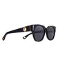 Side profile of THE NYX Black sunglasses with gold accents and polarised lenses