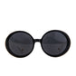 Flat front view of round black and white sunglasses by Fallenbrokenstreet

