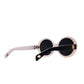 Side profile showing white temple arms and gold detailing on THE ORBIT sunglasses by Fallenbrokenstreet

