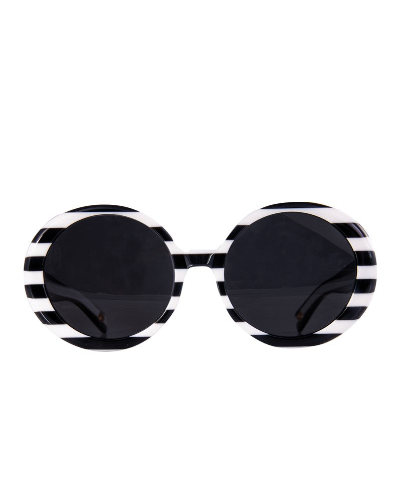 Front view of THE ORBIT – Interstellar round sunglasses with black and white striped acetate frame

