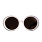 Front view of THE ORBIT – White on Black sunglasses with round white acetate frame and black polarised lenses.

